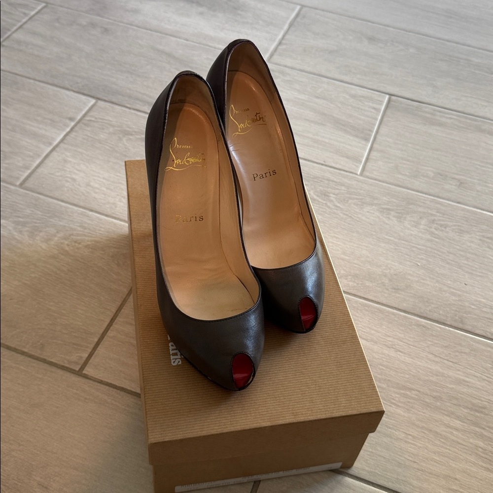 Christian Louboutin Black Peep Toe Pumps with Red Soles